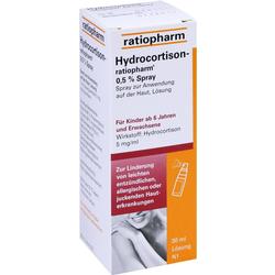 Eine orange-weiße Schachtel mit Hydrocortison-Spray zur Hautanwendung.